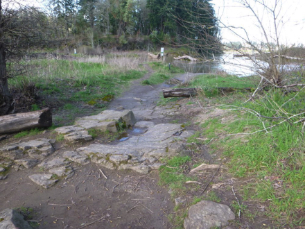 Many boulders across the path leading to the river – unmaintained